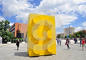 Yellow lego brick in PrishtinaÃ¢â¬â¢s Skanderbeg Square